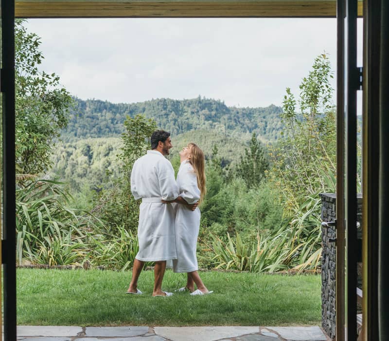 Couple relaxing at Treetops Lodge
